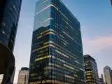 Standard Chartered voit le Bitcoin à 100 000 $ et dit que Strategy vend pour survivre